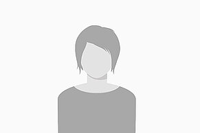 Dummy-Portraitfoto einer weiblichen Mitarbeiterin.