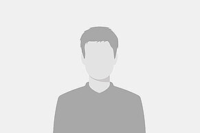 Dummy-Portraitfoto eines männlichen Mitarbeiters.